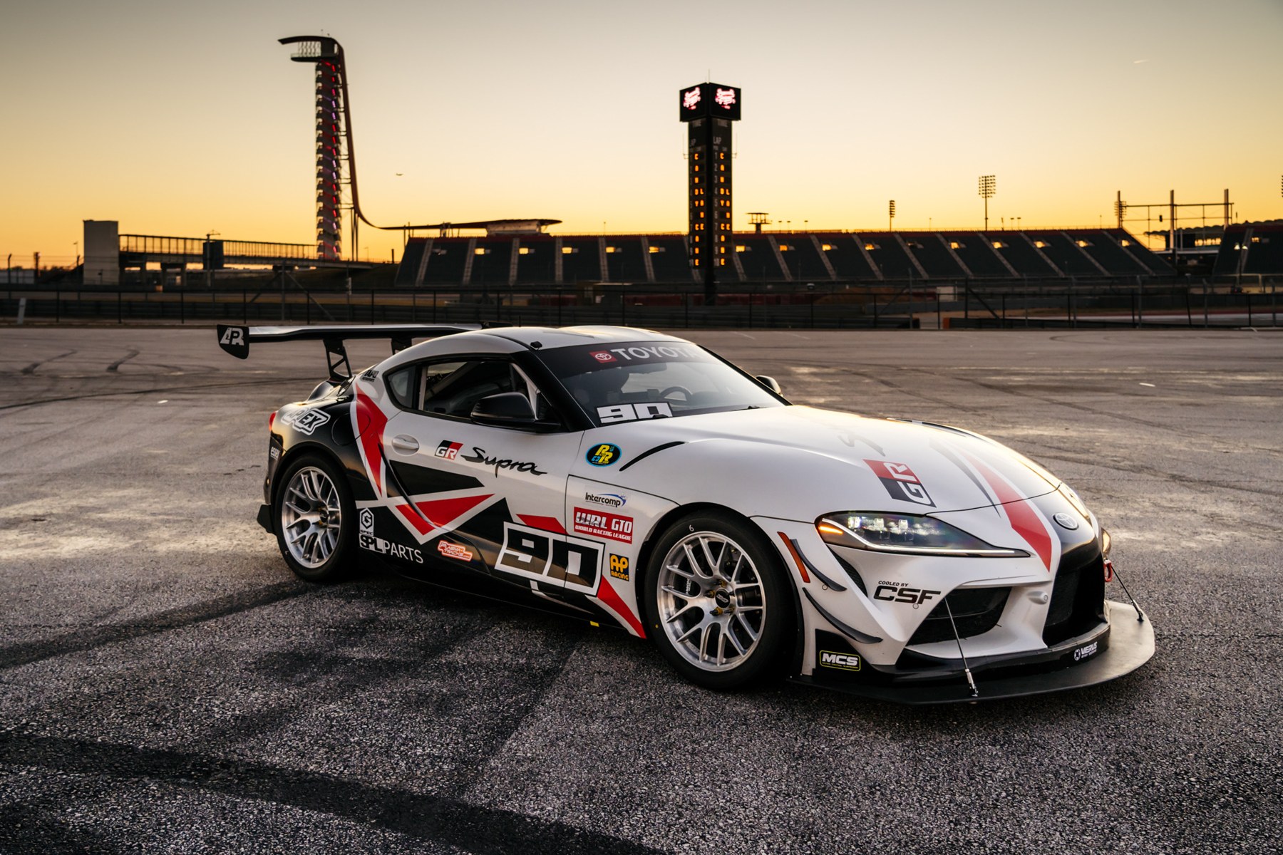 Toyota GR Supra endurance car at COTA at sunset